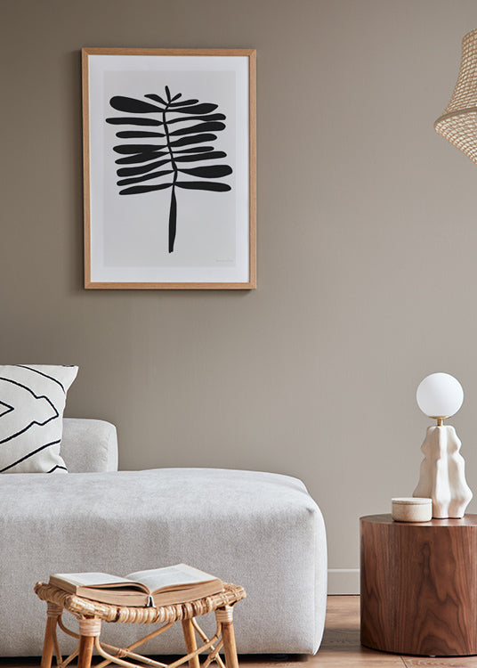 poster, botanisk minimalistisk illustration, svart siluett av växt mot beige bakgrund, Tanja Schaub, ekram, vardagsrum.